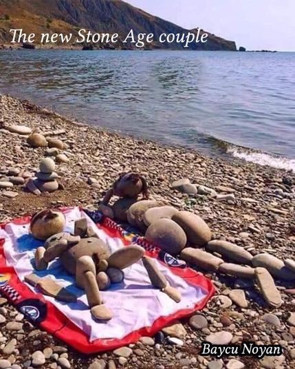 Stone Age Nudists (made of stones at a beach)