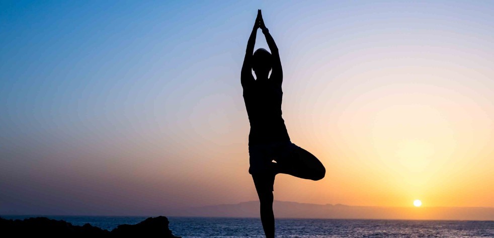 Yoga against a setting sun