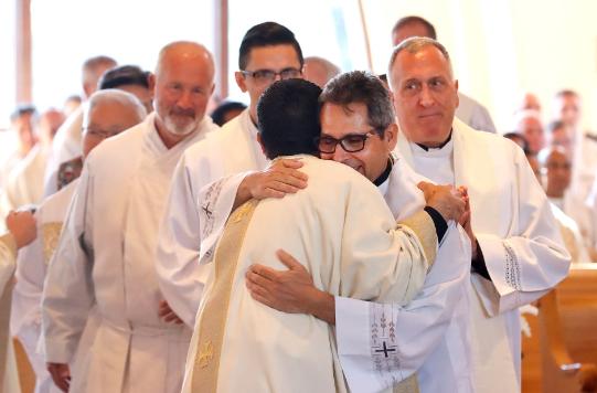 Priests, dressed alike