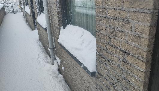 Gallery in front of the apartment, with lots of snow