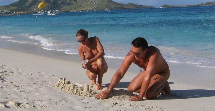 Two nude people on a beach