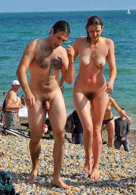 Nudists at a beach.