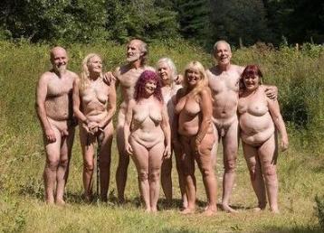 A group of nude people in the sun