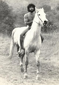 nude man on horse